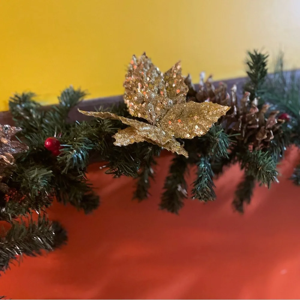 Handmade 9 foot garland with gold poinsettias, berries, pine ones